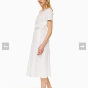 Babaton linen wrap dress white Aritzia summer vacation beach minimalist midi